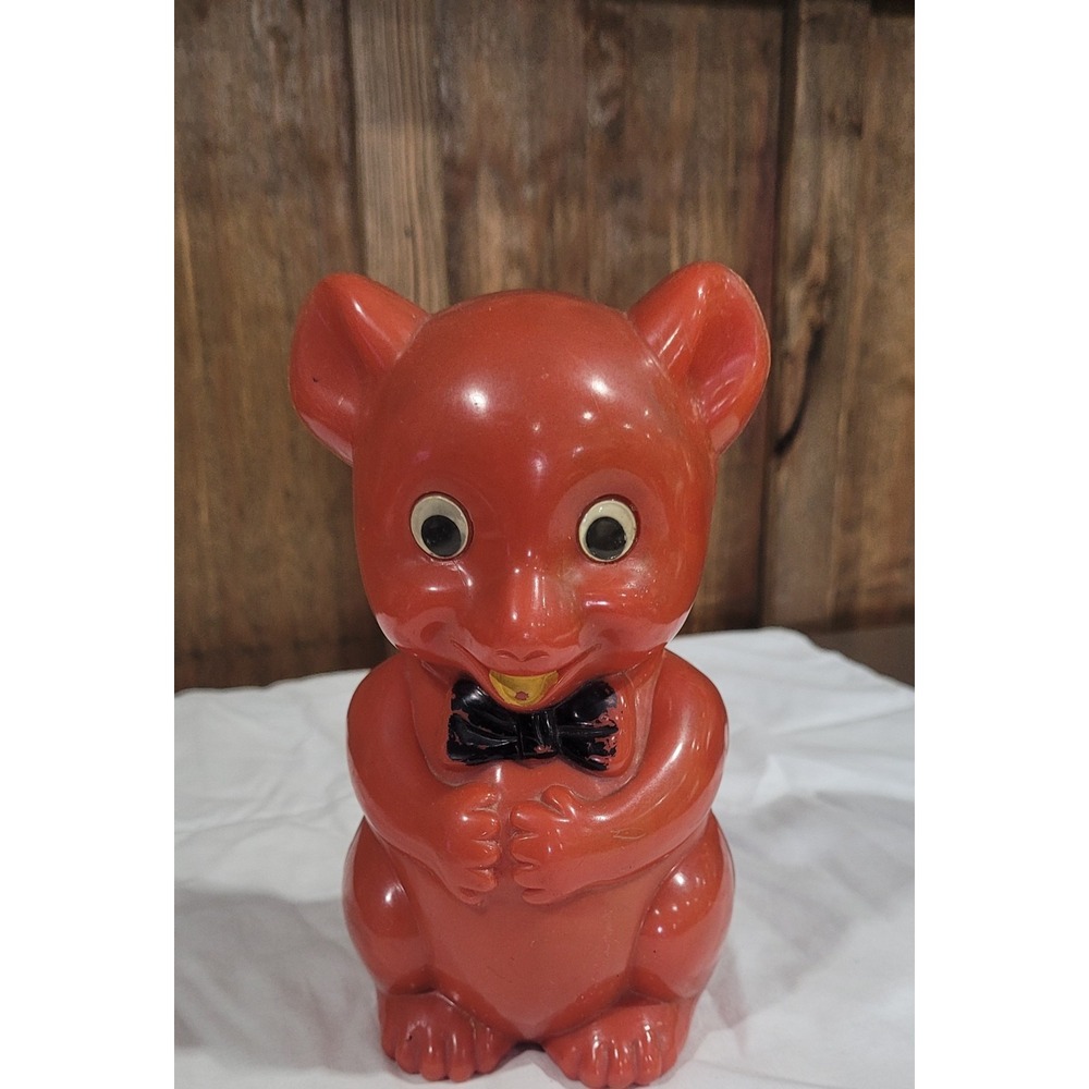 Red Plastic Teddy Bear Coin Bank BEST Yellow Tongue Googly Eyes Vintage 6-1/2"
